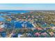 Community overview showcasing marina, homes, and tennis courts at 419 Yacht Harbor Dr, Osprey, FL 34229