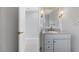 Small bathroom with updated vanity and mirror at 419 Yacht Harbor Dr, Osprey, FL 34229