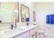 Modern bathroom with double vanity, quartz countertop, and walk-in shower at 4337 Sunmill Ct, Lakewood Ranch, FL 34211