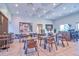 Bright and airy community room with tables and chairs, perfect for gatherings at 4337 Sunmill Ct, Lakewood Ranch, FL 34211