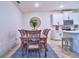 Elegant dining room with a large wood table and a decorative wall accent at 4337 Sunmill Ct, Lakewood Ranch, FL 34211