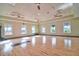 Spacious exercise room with hardwood floors and natural light at 4337 Sunmill Ct, Lakewood Ranch, FL 34211