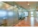 View down a hallway leading to a state-of-the-art fitness center at 4337 Sunmill Ct, Lakewood Ranch, FL 34211