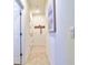 Clean hallway featuring tile floors and coat hooks at 4337 Sunmill Ct, Lakewood Ranch, FL 34211