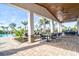 Relaxing covered patio with pool views and comfortable seating at 4337 Sunmill Ct, Lakewood Ranch, FL 34211