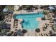 Aerial view of community pool with surrounding lounge chairs at 4337 Sunmill Ct, Lakewood Ranch, FL 34211