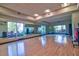 Yoga and fitness studio with hardwood floors and mirrors at 4337 Sunmill Ct, Lakewood Ranch, FL 34211