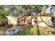 View of the home's backyard, showing a small shed and other outbuildings at 4352 17Th S Ave, St Petersburg, FL 33711