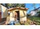 View of a small storage shed with a wooden door at 4352 17Th S Ave, St Petersburg, FL 33711