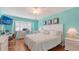 Spacious bedroom with a large bed and work area at 4424 Mount Vernon Dr, Bradenton, FL 34210