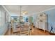 Bright dining room with wood table and white chairs at 4424 Mount Vernon Dr, Bradenton, FL 34210