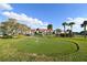 Enjoy a relaxing putting green with beautiful landscaping at 4424 Mount Vernon Dr, Bradenton, FL 34210