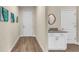 Bright entryway with wood-look floors and white cabinets at 4532 Schoen St, North Port, FL 34291