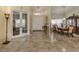 Bright entryway with tile floors and dining area at 4590 Oakley Rd, North Port, FL 34288