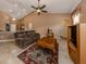 Spacious living room featuring a comfortable couch and high ceilings at 4590 Oakley Rd, North Port, FL 34288