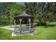 Wooden gazebo in a lush green park setting at 4590 Oakley Rd, North Port, FL 34288