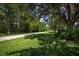 Shaded walking path through a beautiful park at 4590 Oakley Rd, North Port, FL 34288