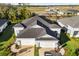 Two-story house with gray roof and attached garage, situated in a residential neighborhood at 4649 Willow Bend Ave, Parrish, FL 34219