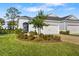 Beautiful house exterior with landscaping and two-car garage at 4649 Willow Bend Ave, Parrish, FL 34219