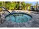 Relaxing hot tub with surrounding patio at 4649 Willow Bend Ave, Parrish, FL 34219