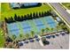 Aerial view of four pickleball courts with surrounding landscaping and parking at 4649 Willow Bend Ave, Parrish, FL 34219