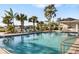 Resort-style pool with lounge chairs and a shaded area at 4649 Willow Bend Ave, Parrish, FL 34219