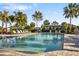 Inviting community pool with ample lounge chairs at 4649 Willow Bend Ave, Parrish, FL 34219