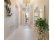 Bright and airy foyer with tile flooring at 4839 Pastel Ct, Sarasota, FL 34240