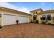 Two-car garage with paver driveway at 4839 Pastel Ct, Sarasota, FL 34240