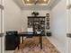 Spacious home office with built-in shelving at 4839 Pastel Ct, Sarasota, FL 34240