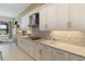 Modern kitchen with white cabinets and granite countertops at 4839 Pastel Ct, Sarasota, FL 34240