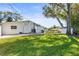 Large backyard with grassy area and shed at 504 68Th Avenue W Dr, Bradenton, FL 34207