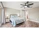 Bedroom with a queen bed and wood-look floors at 504 68Th Avenue W Dr, Bradenton, FL 34207