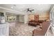 Living room showcasing a wood accent wall and comfortable seating at 504 68Th Avenue W Dr, Bradenton, FL 34207