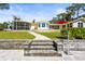 Stone pathway leading to a beautiful waterfront home at 504 68Th Avenue W Dr, Bradenton, FL 34207