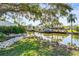 Landscaped waterfront lot with canal view at 504 68Th Avenue W Dr, Bradenton, FL 34207