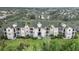 Aerial view of a condo building, showing its size and landscaping at 5180 Northridge Rd # 211, Sarasota, FL 34238