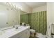 Clean bathroom with updated vanity and shower/tub combo at 5180 Northridge Rd # 211, Sarasota, FL 34238