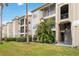 Well-maintained condo building with landscaping at 5180 Northridge Rd # 211, Sarasota, FL 34238