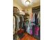 Large walk-in closet with ample shelving and hanging space at 5180 Northridge Rd # 211, Sarasota, FL 34238