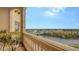 Peaceful balcony showcasing scenic river and city views at 5531 Cannes Cir # 802, Sarasota, FL 34231