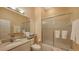 Clean bathroom with a shower/tub combo and updated vanity at 5531 Cannes Cir # 802, Sarasota, FL 34231