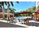 Enjoy the sun on the lounge chairs around the refreshing pool at 5531 Cannes Cir # 802, Sarasota, FL 34231