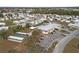 Aerial view of community with homes and amenities at 5539 Holiday Park Blvd, North Port, FL 34287