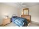 Simple bedroom with a single bed and ceiling fan at 5539 Holiday Park Blvd, North Port, FL 34287