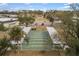 Shuffleboard courts with covered seating areas at 5539 Holiday Park Blvd, North Port, FL 34287