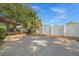 Gravel backyard area with a covered structure at 5823 26Th W St, Bradenton, FL 34207