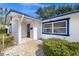 Front entrance with walkway, mailbox, and landscaping at 5823 26Th W St, Bradenton, FL 34207