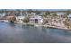 Wide aerial showcasing waterfront homes and canals at 608 Bayview Dr, Longboat Key, FL 34228