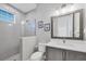 Guest bathroom with shower, toilet, and vanity at 608 Bayview Dr, Longboat Key, FL 34228